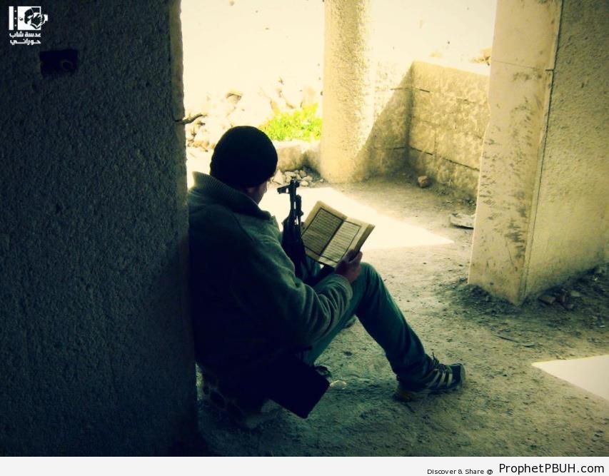 Anti-Government Syrian Fighter Reading Quran - Photos 