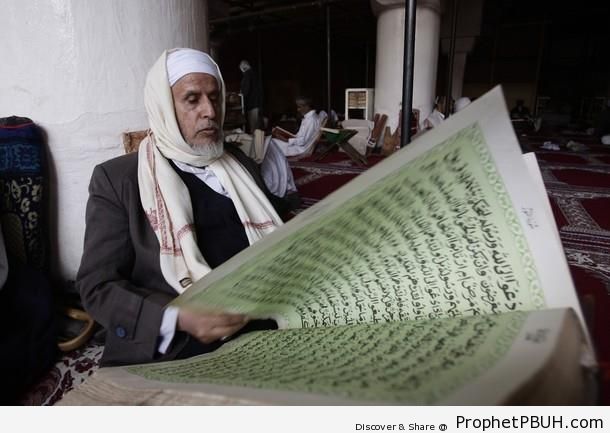 Elderly Yemeni Man Reading the Quran - Al-Jami` al-Kabir (The Grand Mosque) in Sanaa, Yemen