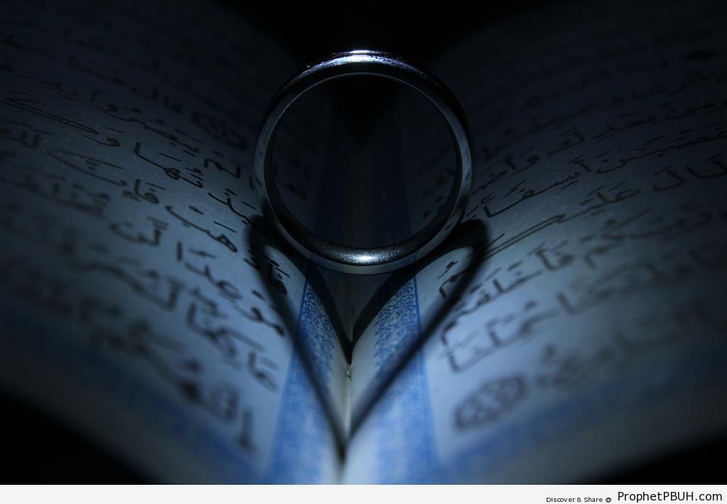 Heart-Shaped Shadow on Book of Quran - Mushaf Photos (Books of Quran) 