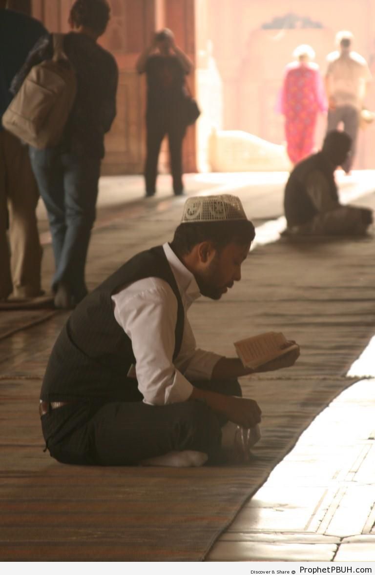 Indian Muslim Man Reading Quran at Jama Masjid in Old Delhi - Delhi, India -Picture