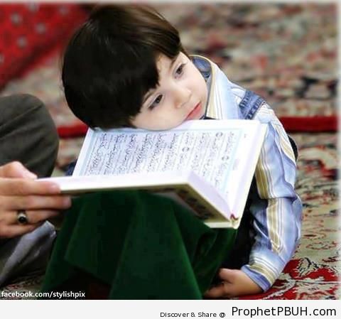 Little Boy Leaning on Mushaf - Mushaf Photos (Books of Quran)