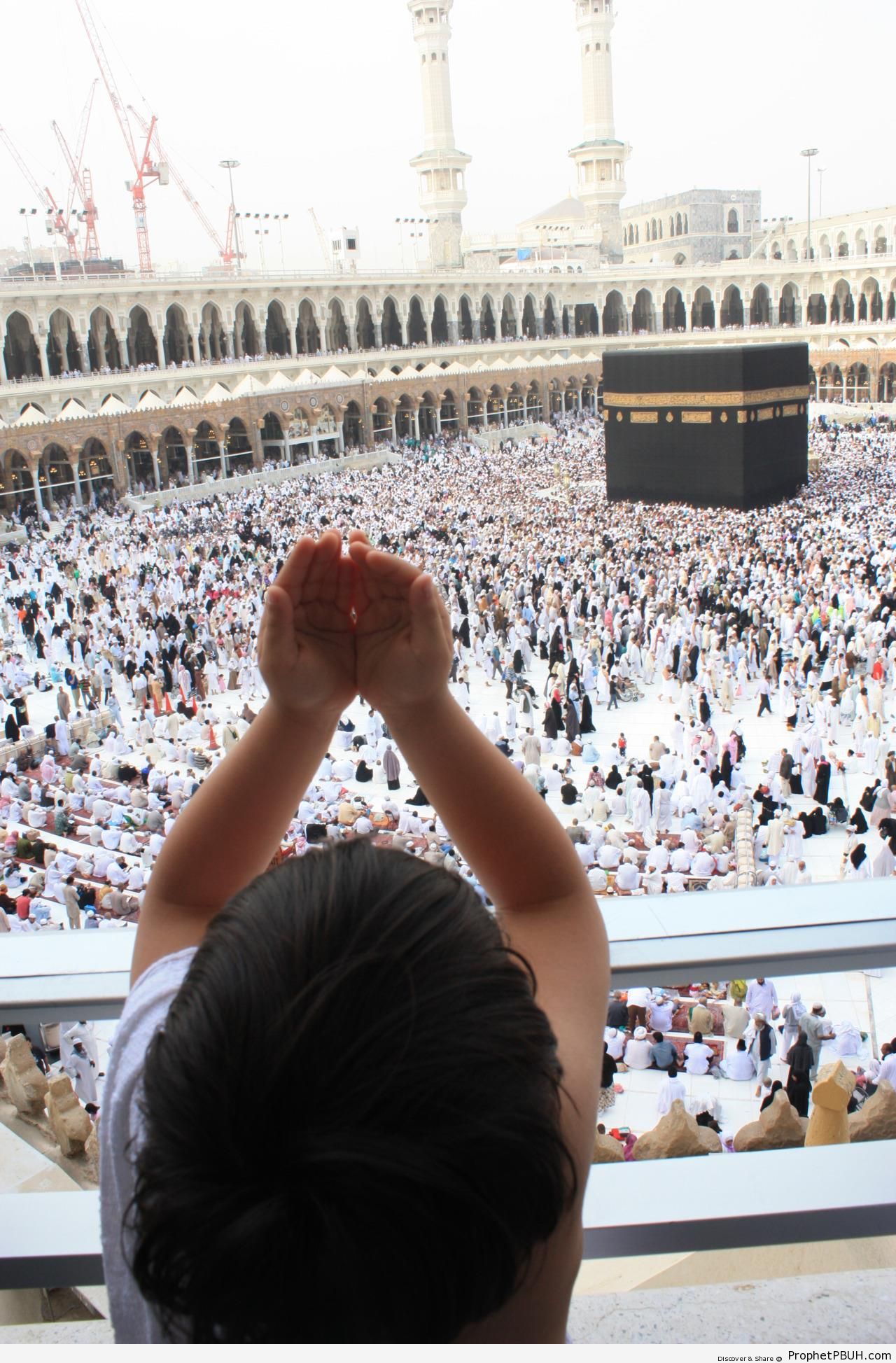 Little Boy Making Dua at Masjid al-Haram - al-Masjid al-Haram in Makkah, Saudi Arabia -Pictures