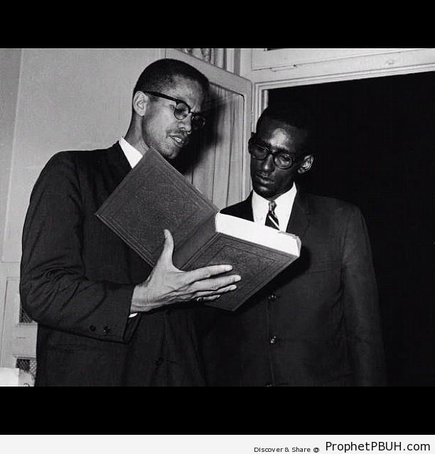 Malcolm X Holding Book of Quran - Mushaf Photos (Books of Quran)