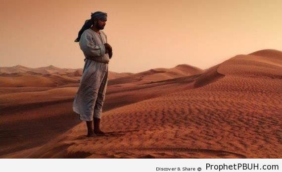 Man Prays in the Desert - Photos