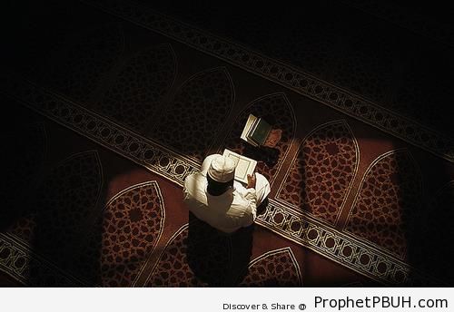 Man Reading Quran - Photos