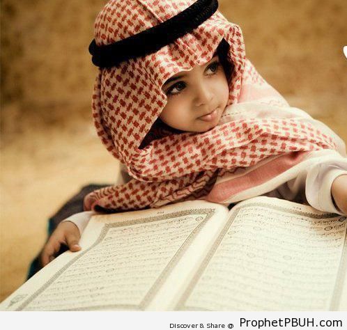 Muslim Little Boy and His Mushaf - Mushaf Photos (Books of Quran)