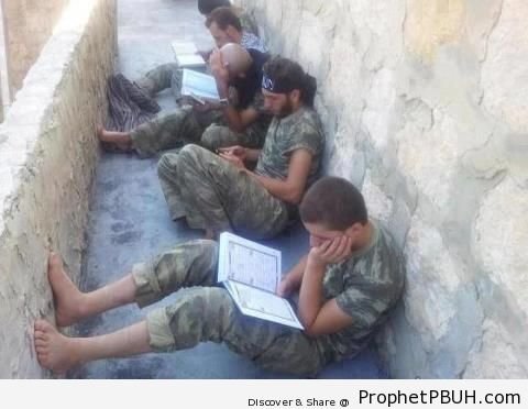 Syrian Freedom Fighters Reading Quran - Photos