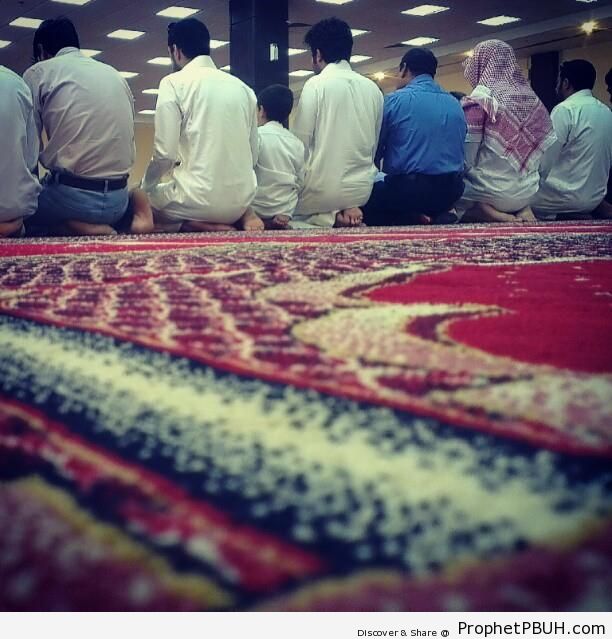 A Row of Muslim Men at Prayer - Islamic Architecture
