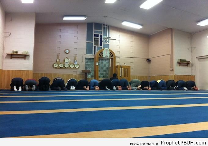American Muslims Praying at Lawrence Islamic Center in Lawrence, Kansas - Kansas, United States 