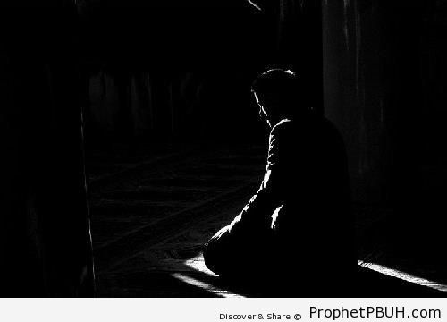 Dark Photo of Muslim Man Praying - Photos