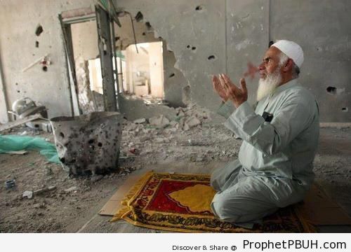 Elderly Muslim Man Prays in a Demolished Building - Photos of Elderly Male Muslims