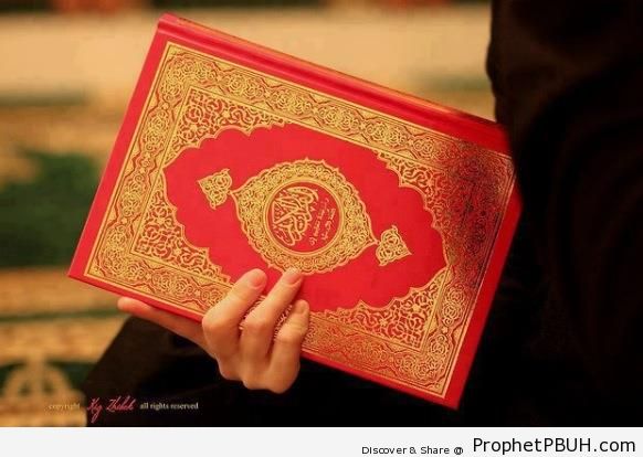 Holding a Mushaf - Mushaf Photos (Books of Quran)