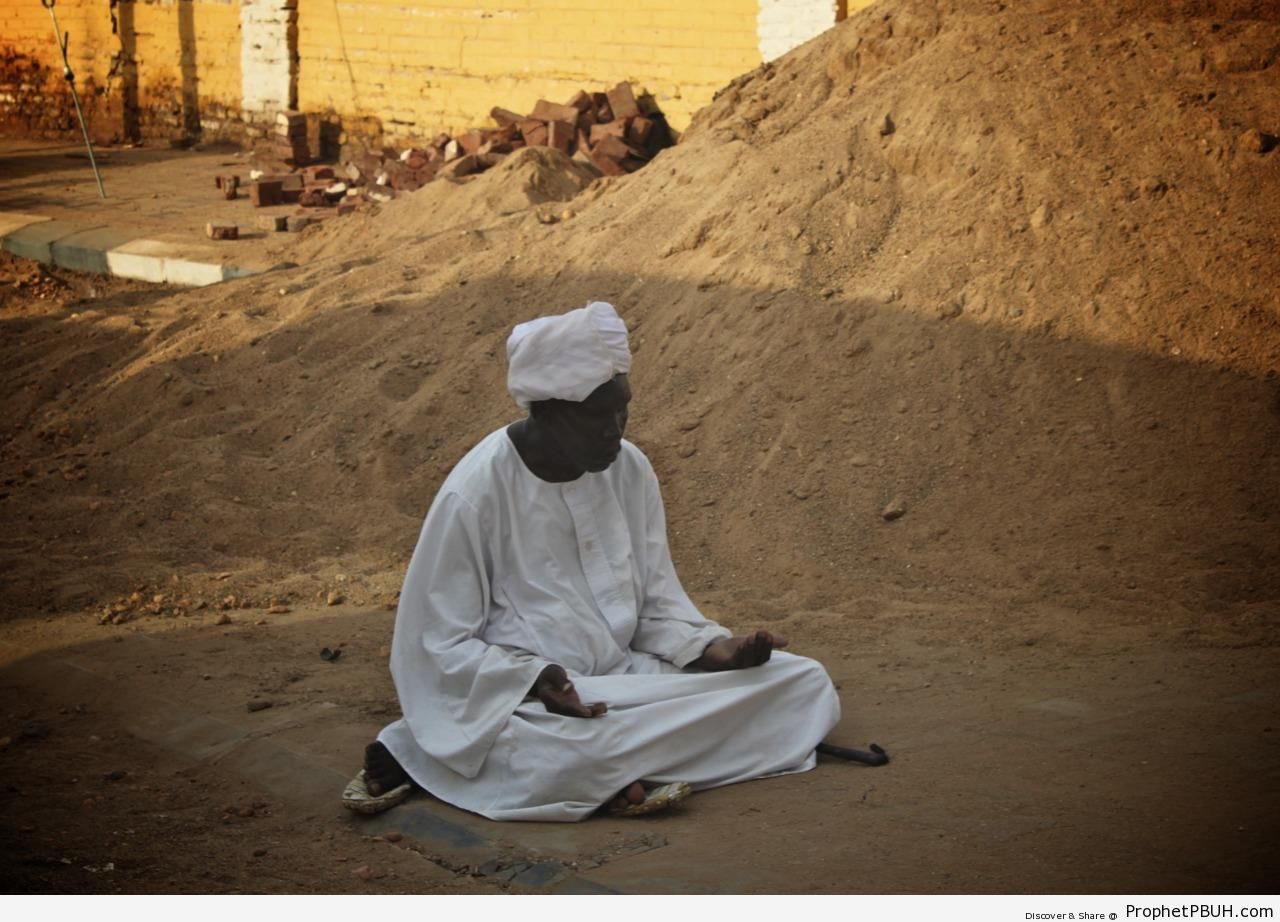 Man Making Dua in the Street (Sudan) - Photos -Pictures