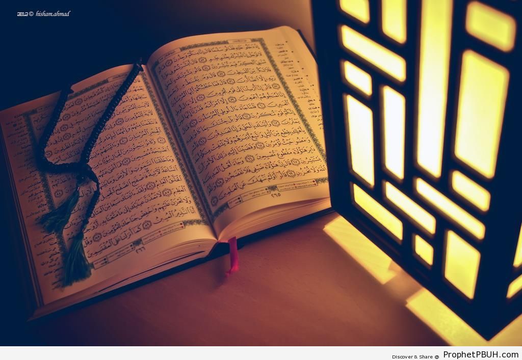 Open Book of Quran Illuminated by Lantern - Mushaf Photos (Books of Quran) 