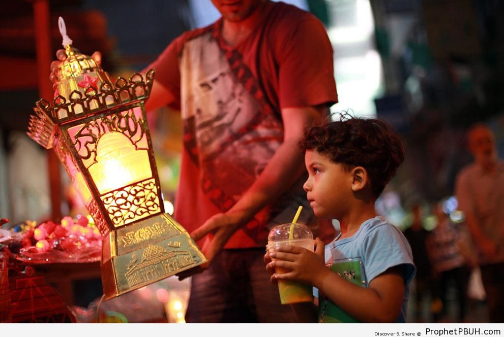 Palestinian Boy Looking at Islamic Lantern with Allahu Akbar Calligraphy (Ramadan 2013) - Allahu Akbar Calligraphy and Typography 
