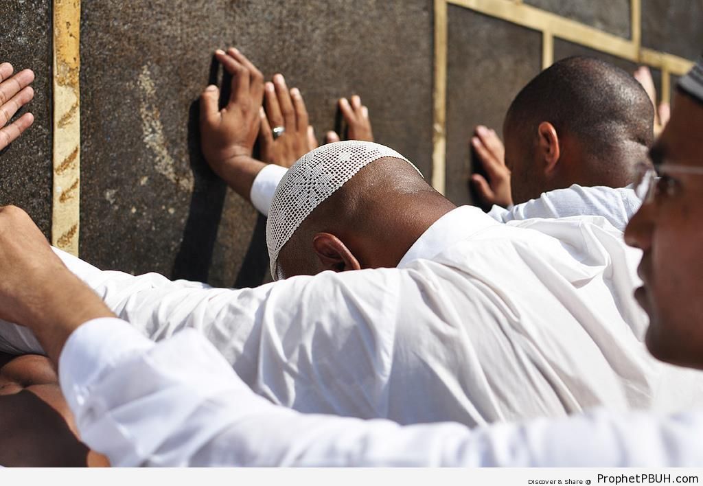 Pilgrims Touching the Kaba - al-Masjid al-Haram in Makkah, Saudi Arabia -005