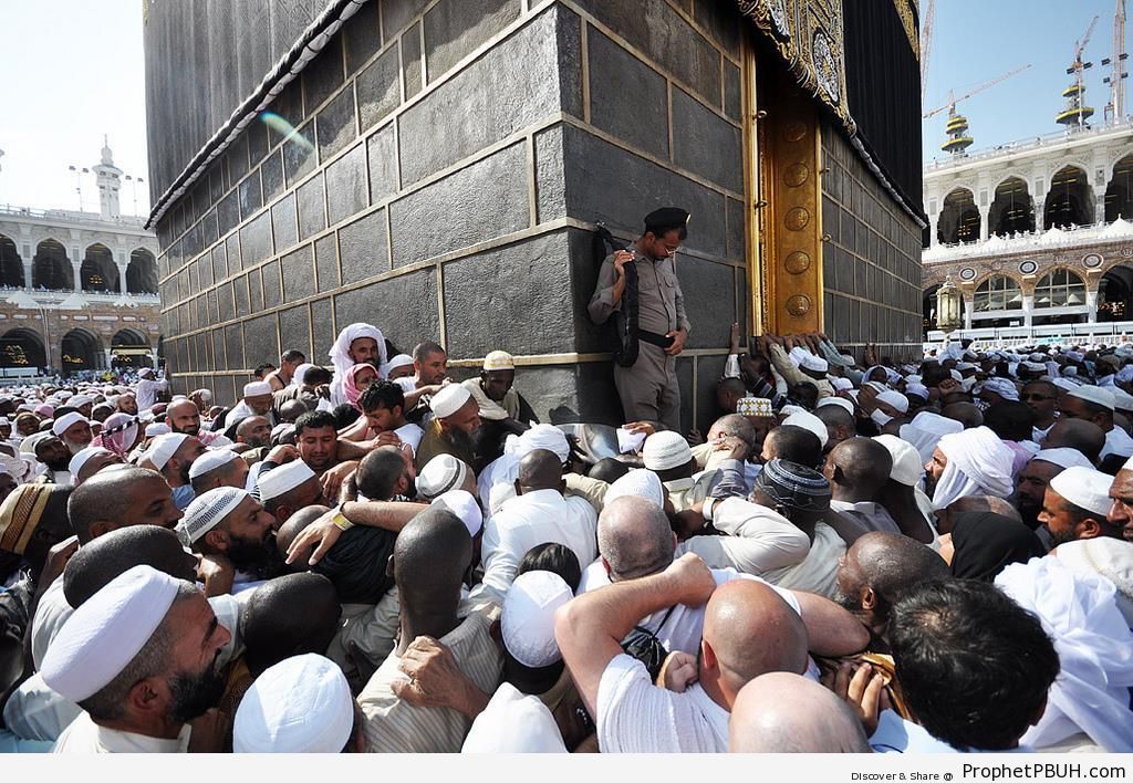 Pilgrims Trying to Kiss the Black Stone (Hajar al-Aswad) - al-Masjid al-Haram in Makkah, Saudi Arabia -Picture
