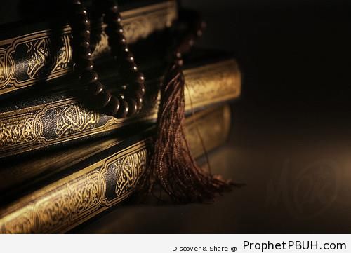 Prayer Beads on Stack of Mushafs - Mushaf Photos (Books of Quran)