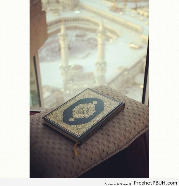 Quran on Pillow, and View of the Sacred Mosque from Hotel Window - al-Masjid al-Haram in Makkah, Saudi Arabia