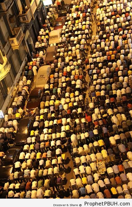 Rows of Muslim Men Praying in Street - Photos