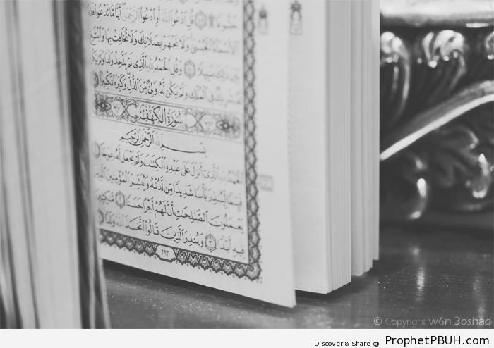Standing Book of Quran Showing Surat al-Kahf - Islamic Black and White Photos 
