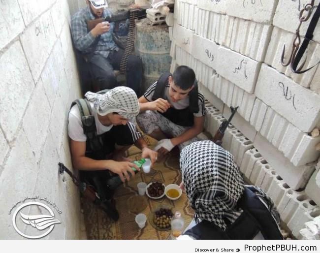 Syrian Revolutionaries Having Iftar Meal (Ramadan 2012) - Islamic Quotes About the Month of Ramadan