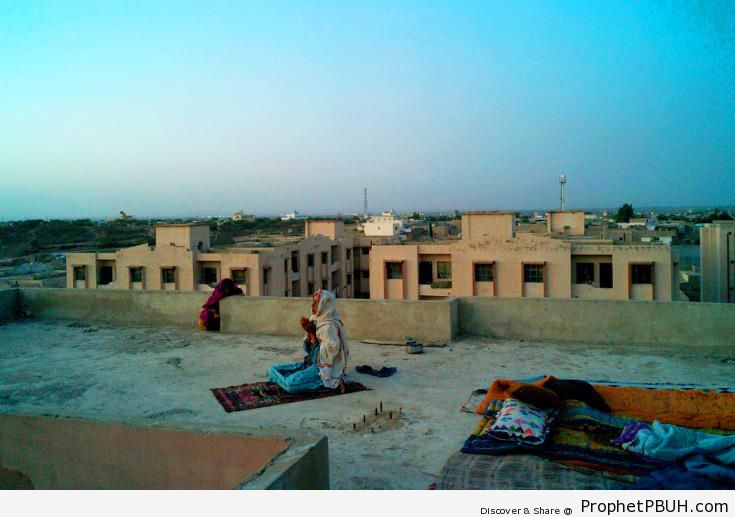 Woman Praying on Rooftop (Karachi, Pakistan) - Muslimah Photos (Girls and Women & Hijab Photos)